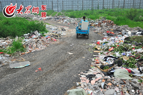西城广利河沿岸垃圾遍地 东营城管将近期清理